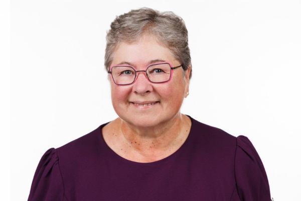 headshot portrait of CEO and Registrar, Sue Smith